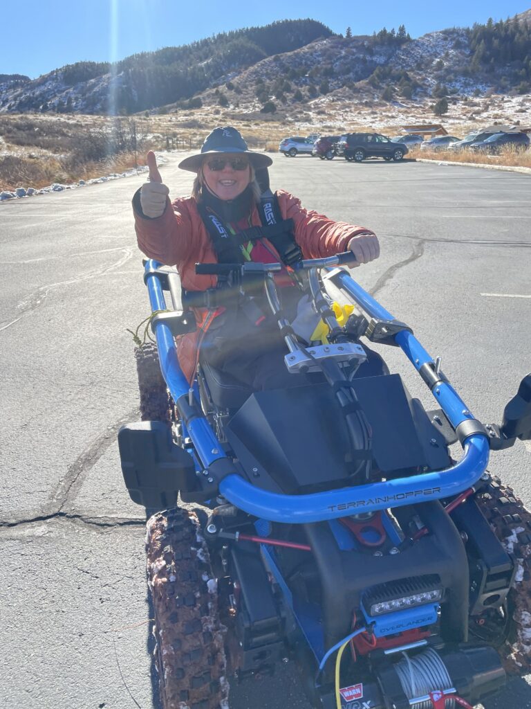 Kirsten on a mobility device.