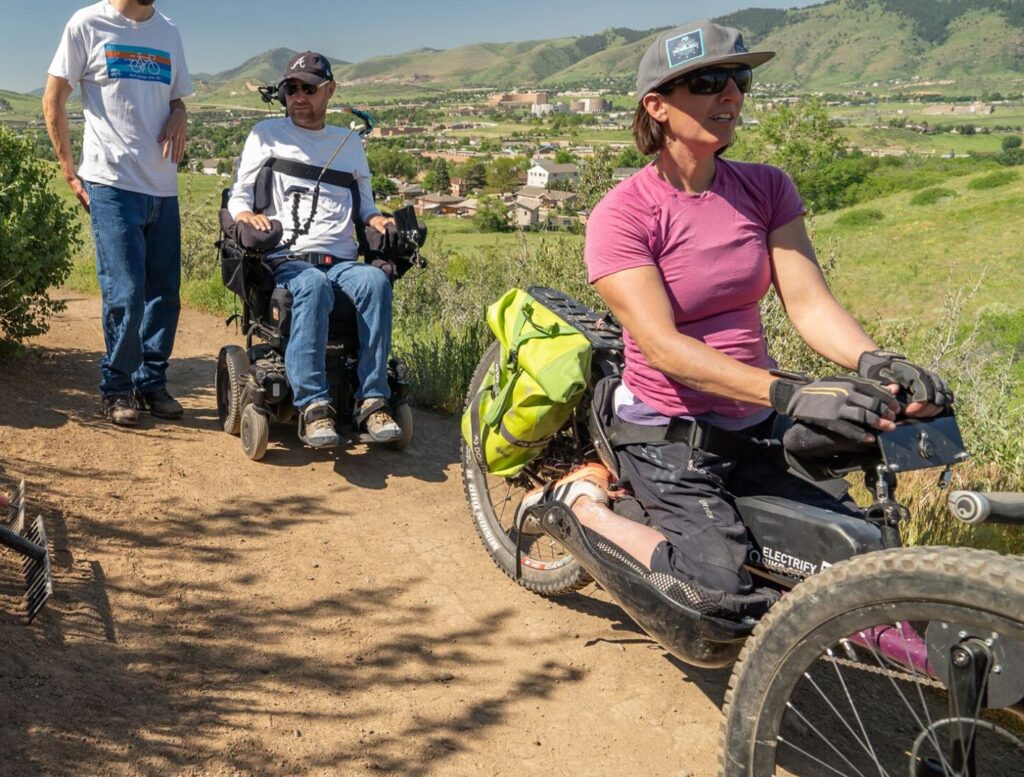 Park visitors on adaptive recreation devices on a Jeffco Open Space Park trail.